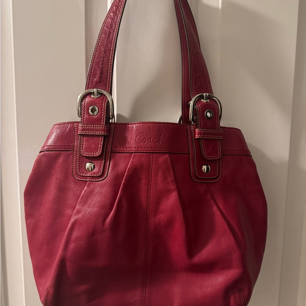 Red Coach leather shoulder bag with adjustable straps